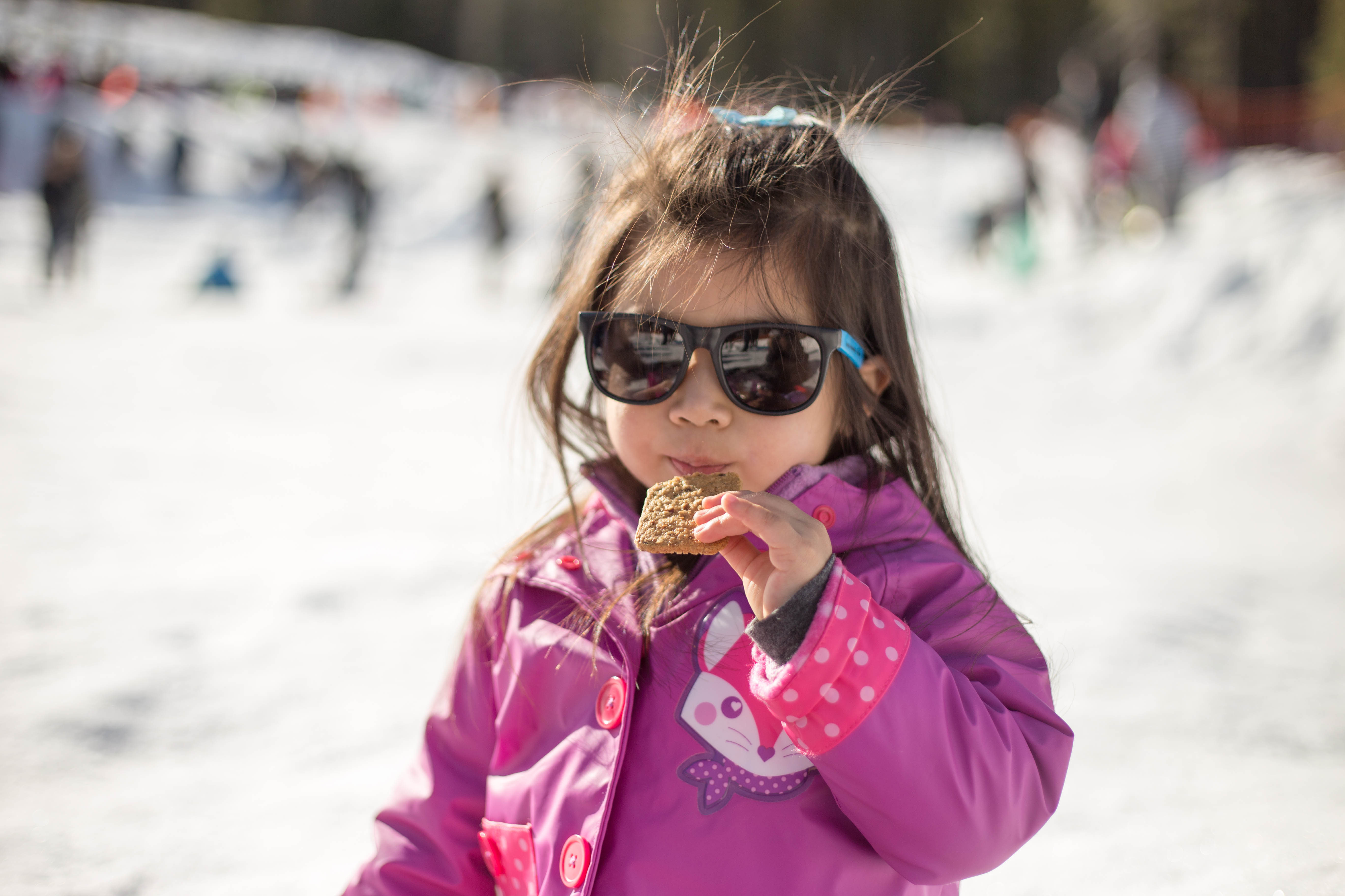 Lookin' good while eating snacks in the snow.