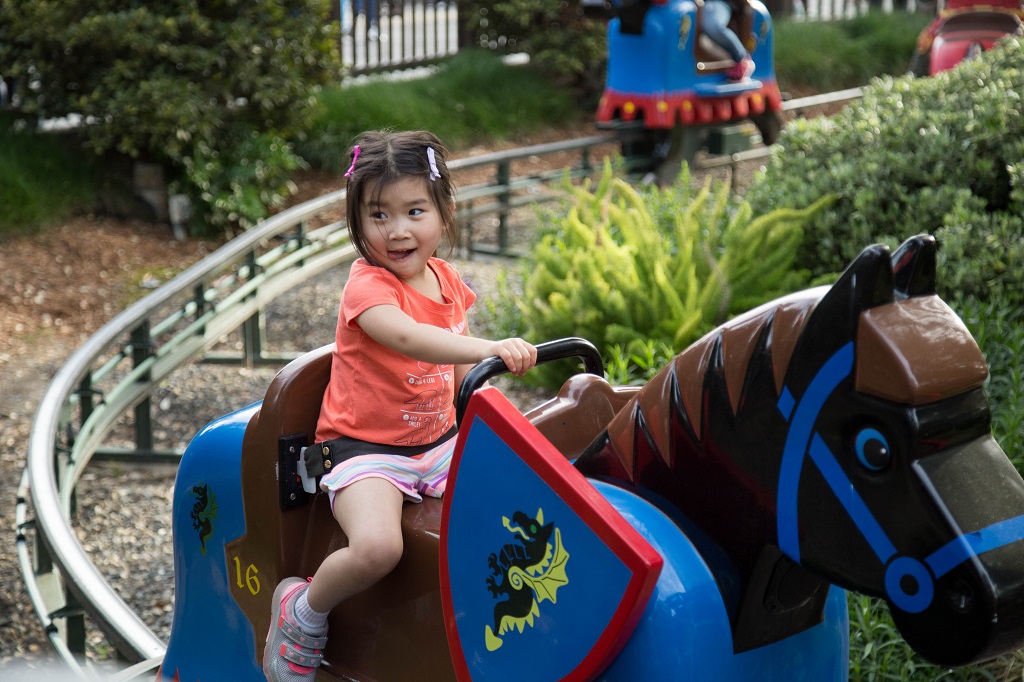 Kayli went on a horsey ride all by herself and she stuck her tongue out the entire ride!