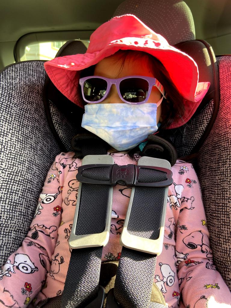 Sometimes Meimei does silly things and wears tons of stuff on her head in the car.