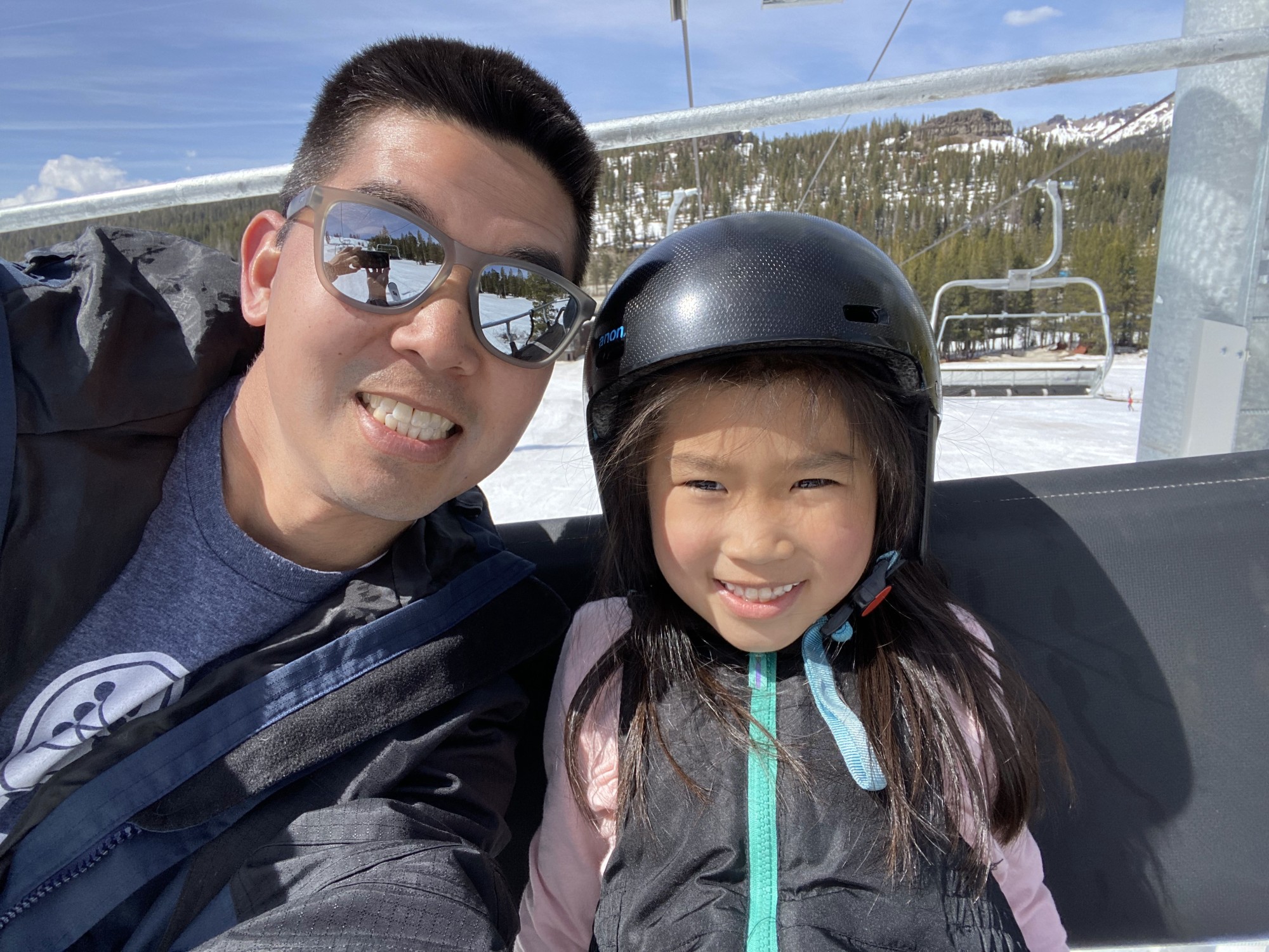 Daddy and Kayli look awesome on the ski lift!